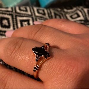 Fragrant Jewels black and gold ring